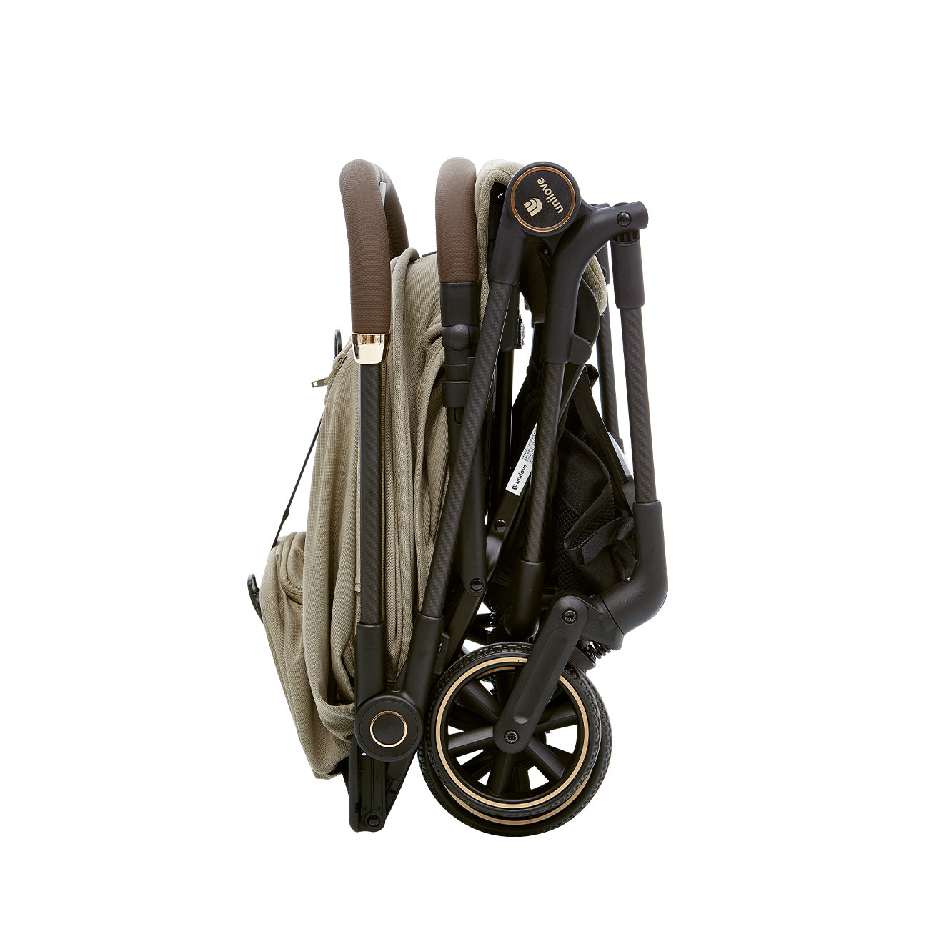 Folded baby stroller with beige cover and black frame on a white background