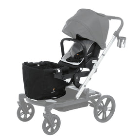 Gray stroller with a black car seat attachment on a white background